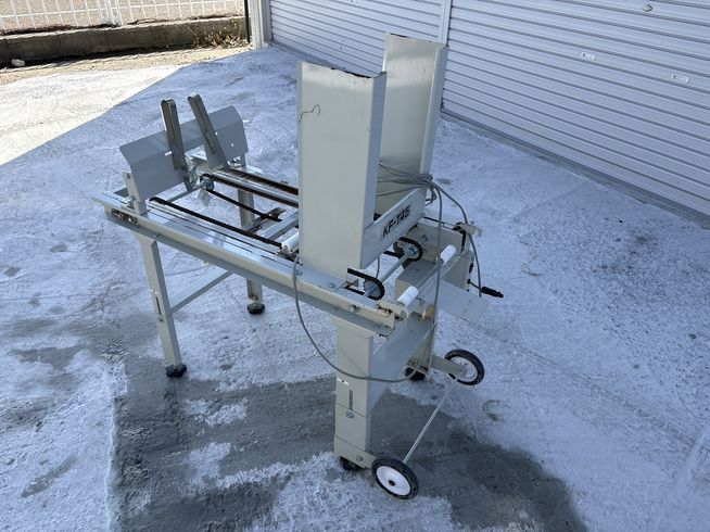 コンマ 苗箱供給機 写真